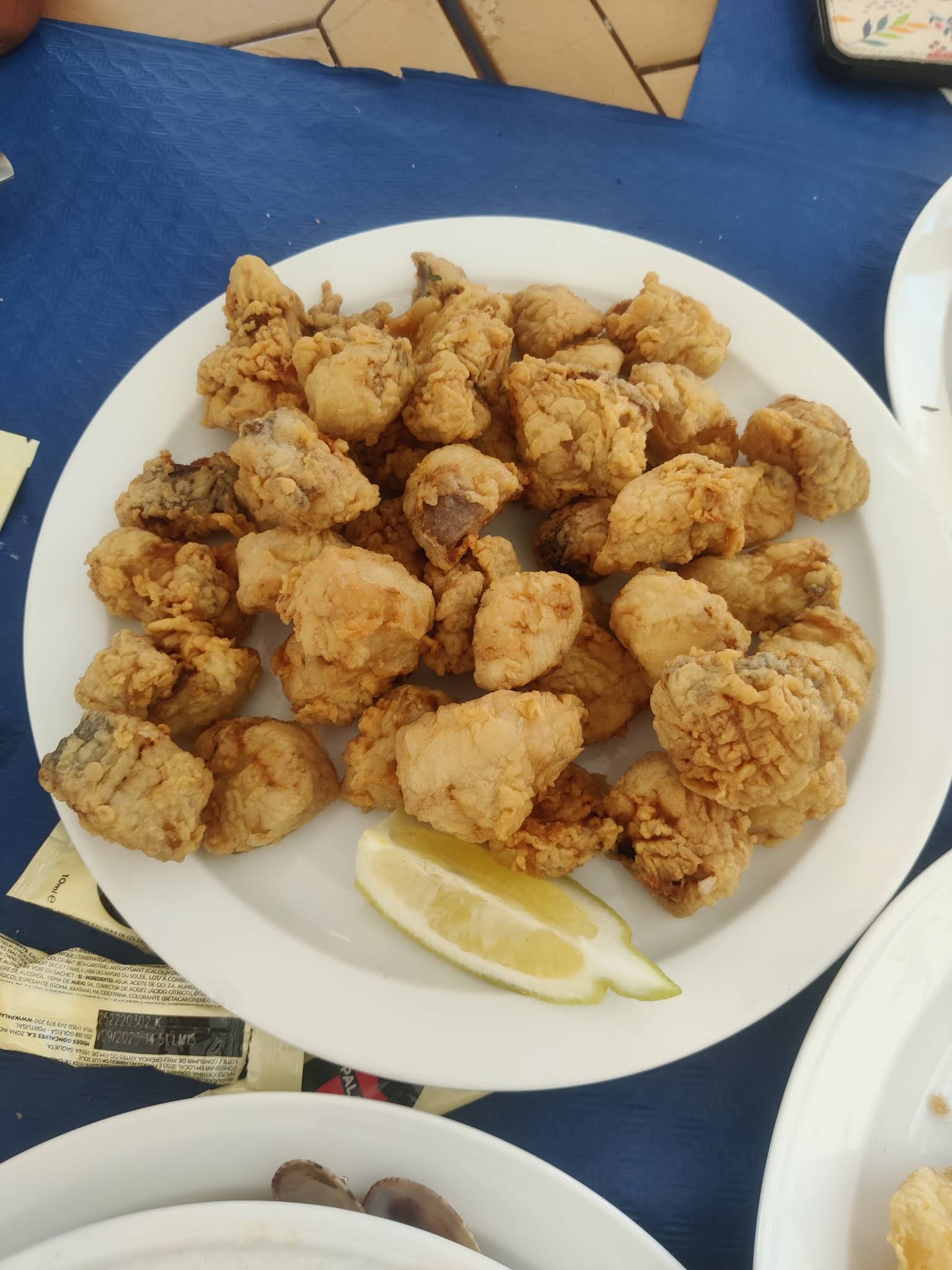 Crispy fried fish with lemon